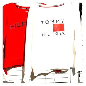 Two Tommy Hilfiger sport sweaters.